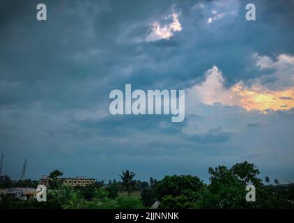 Cloudy sky before a storm over a city Stock Photo - Alamy
