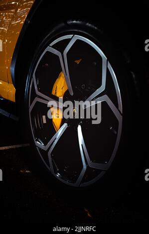 A vertical shot of Lamborghini Urus of alloy wheel and disc brake Stock Photo