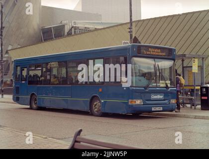 Salford, UK - June 2022: A bus for tram replacement service at MediaCityUK bus stop. Stock Photo