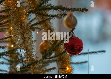 A closeup shot of Christmas tree decorations Stock Photo