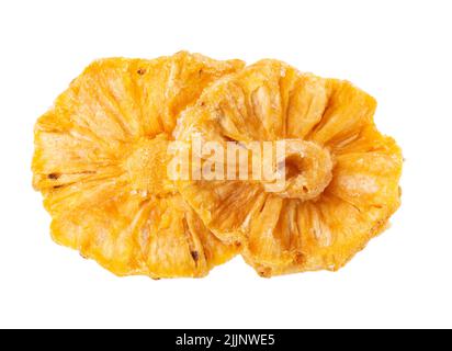 Dried candied pineapple rings isolated on white background. Clipping path Stock Photo