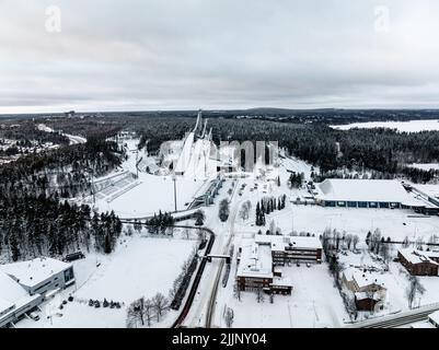Aerial drone view of the Ski jump towers, winter evening in Lahti, Finland Stock Photo