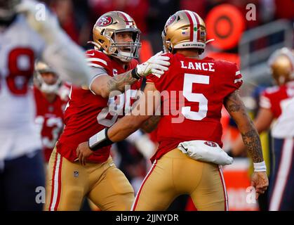Santa Clara, United States. 02nd Jan, 2022. SANTA CLARA, CALIFORNIA - JANUARY 2: San Francisco 49ers starting quarterback Trey Lance (5) is congratulated on his touchdown throw to San Francisco 49ers' Deebo Samuel (19) by San Francisco 49ers' George Kittle (85) in the fourth quarter at Levi's Stadium in Santa Clara, Calif., on Sunday, Jan. 2, 2022. (Photo by Nhat V. Meyer/Bay Area News Group/TNS/Sipa USA) Credit: Sipa USA/Alamy Live News Stock Photo