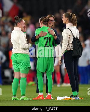 France head coach Corinne Diacre goes to console goalkeeper Pauline Peyraud-Magnin after the UEFA Women's Euro 2022 semi-final match at Stadium MK, Milton Keynes. Picture date: Wednesday July 27, 2022. Stock Photo