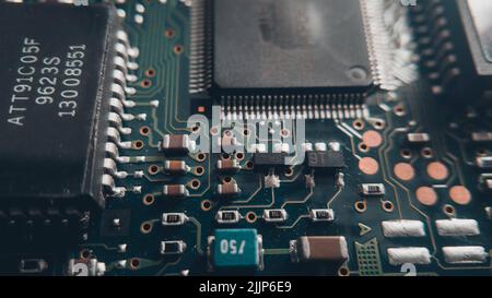 A closeup shot of the electronic circuit board with chips and components Stock Photo