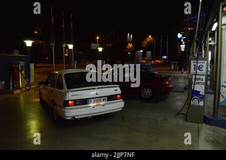 A view of parked Ford Sierra classic street car at night Stock Photo