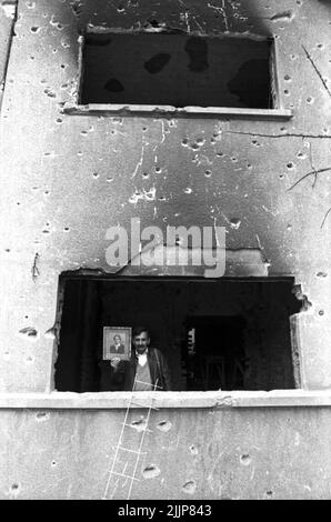 Bucharest, Romania, January 1990. Buildings deteriorated by the gunfire during the Romanian anticommunist revolution of December 1989. Stock Photo