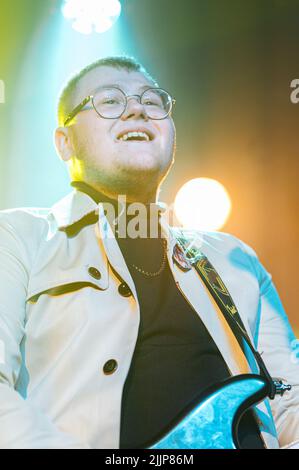 The Lathums band performing live at a concert, focus on guitarist and vocalist Alex Moore Stock Photo