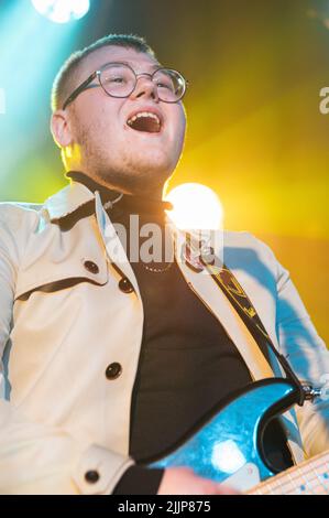 The Lathums band performing live at a concert, focus on guitarist and vocalist Alex Moore Stock Photo