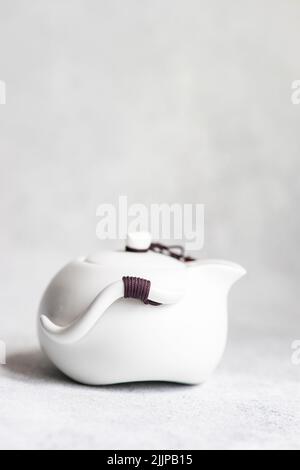 Close-up of an Asian tea pot on a table Stock Photo