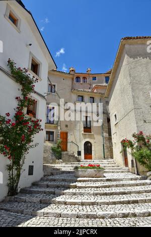 A vertical view of the narrow street among old stone houses of Civitella Alfedena, Abruzzo, Italy Stock Photo