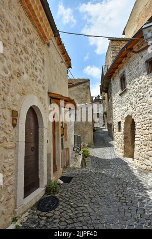 A view of narrow street among old stone houses of Pacentro Stock Photo