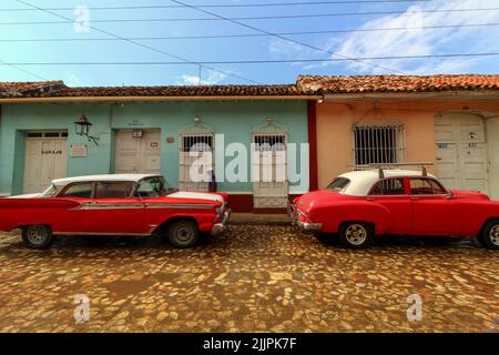 A beautiful view of colonial old town with colorful buildings and cars, Trinidad, Cuba Stock Photo