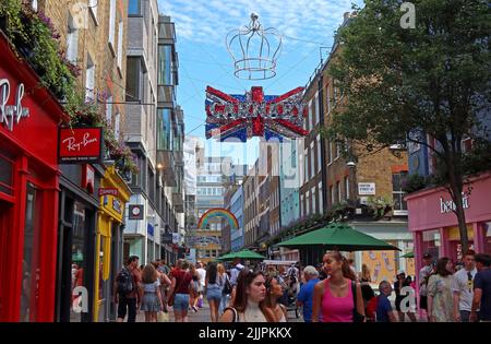 Crown and British union flag in the famous Carnaby Street, Soho, London, England, UK, W1F 9PS Stock Photo