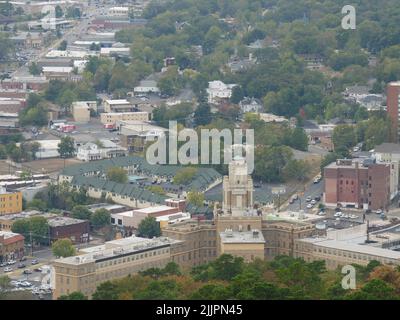 An aerial cityscape of Arkansas surrounded by buildings and trees Stock Photo