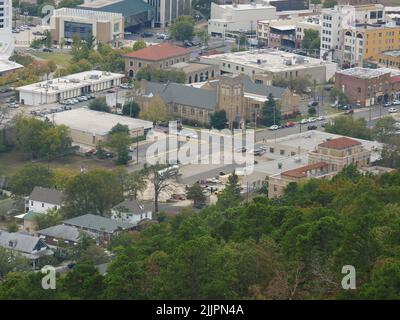 An aerial cityscape of Arkansas surrounded by buildings and trees Stock Photo