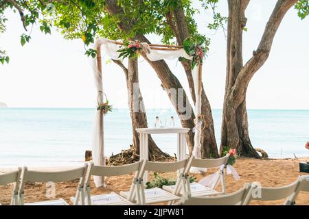 A simple beach wedding set up on the seaside Stock Photo