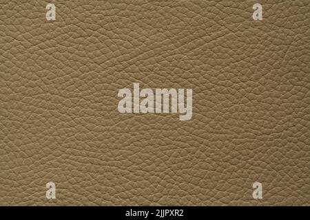 A beige leather texture pattern background, perfect for wallpapers Stock Photo