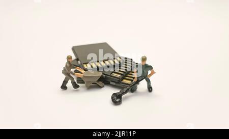 The miniature workers transferring memory cards Stock Photo
