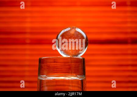 Detailed photo of glass balls photographed in the studio, well suited as a background Stock Photo
