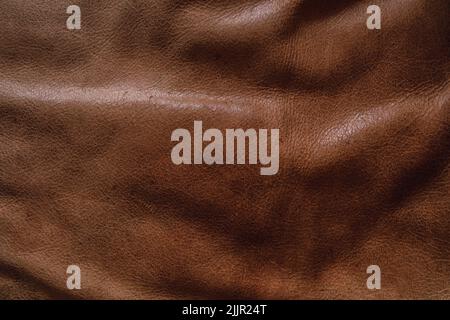 Medium brown leather couch sofa cushion material textu Stock Photo