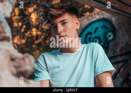 A young blonde Spanish man looking at the camera Stock Photo