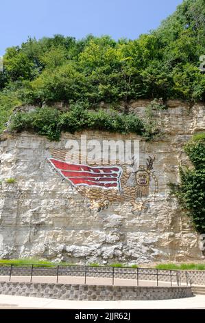 A painting of the Piasa bird on the cliffs overlooking the Mississippi River in Alton, Illinois Stock Photo