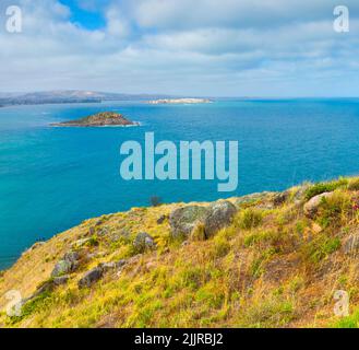 Encounter Bay in Victor Harbor, seen from the bluff at Rosetta Head, looking towards Wright Island and Granite Island. Stock Photo