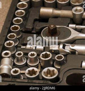 A set of socket wrenches.Locksmith tools in a box. A tool for car repair. Selective focus Stock Photo