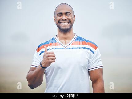 Its a good day for some sport. a young sportsman giving the thumbs up during practice. Stock Photo