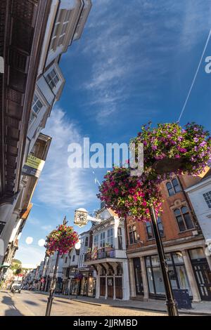 Famous place in England Guildford High Street The Guildhall historic architecture early morning sunlight Guildford Surrey England Europe Stock Photo