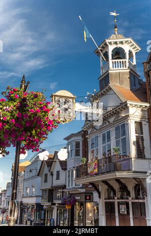 Famous place in England Guildford High Street The Guildhall historic architecture early morning sunlight Guildford Surrey England Europe Stock Photo