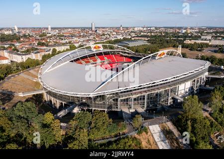 Leipzig, Germany. 27th July, 2022. View of the Red Bull Arena Leipzig, now completely equipped with red seats. RB Leipzig's home arena holds up to 47,069 spectators. (Aerial view with drone) Credit: Jan Woitas/dpa/Alamy Live News Stock Photo