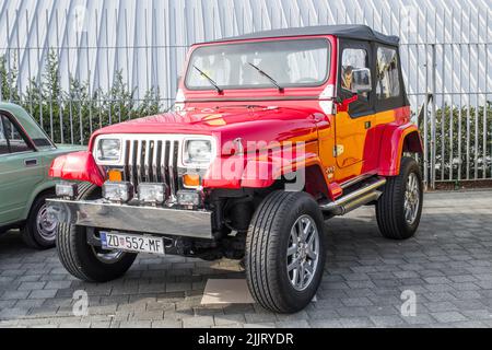 A photo of Jeep wrangler YJ displayed on classical car exhibition Stock Photo