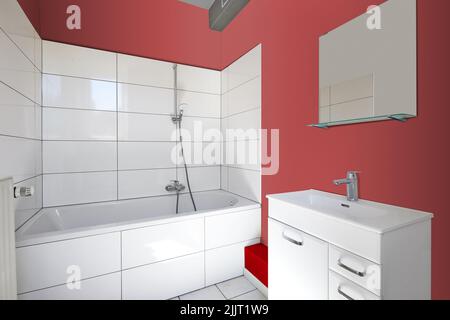 Renovated bathroom with white tiles and new sink Stock Photo