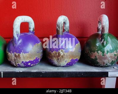 A close-up shot of old rusty dumbbells Stock Photo