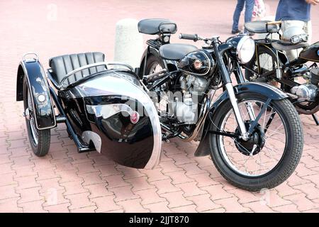 Old fashioned motorcycle with sidecar parked in the street Stock Photo ...