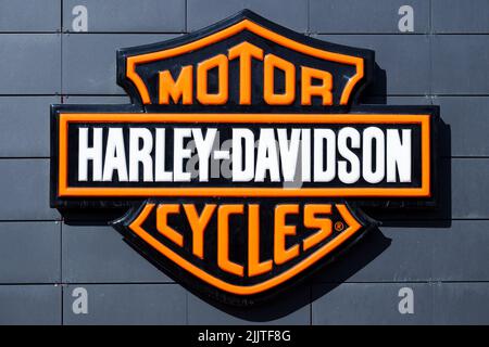 Minsk, Belarus - March 09, 2022: Harley-Davidson sign at motorcycle salon shopping center on Pobediteley Avenue in Minsk Stock Photo