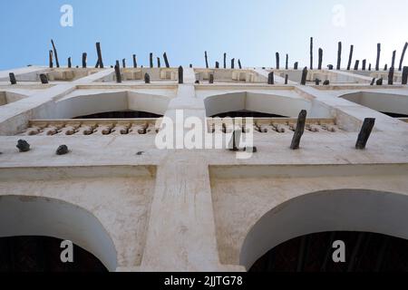 A low angle of a vintage Arabic design building in Doha, Qatar