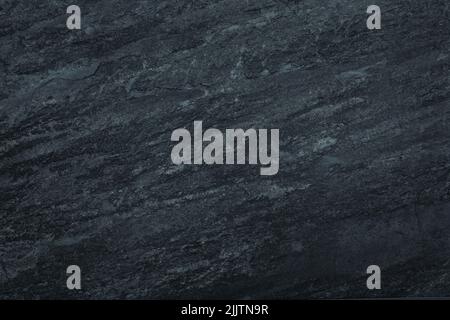 Gloomy black surface background. Abstract grunge rough peeled painted texture Stock Photo
