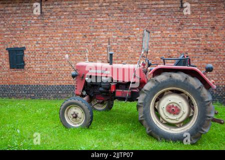 Hoogstraten, Belgium, 22nd June 2013, A vintage McCormick Deering tractor on display at a farm. High quality photo Stock Photo