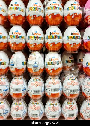 A vertical shot of Kinder brand chocolate surprise eggs in a supermarket Stock Photo