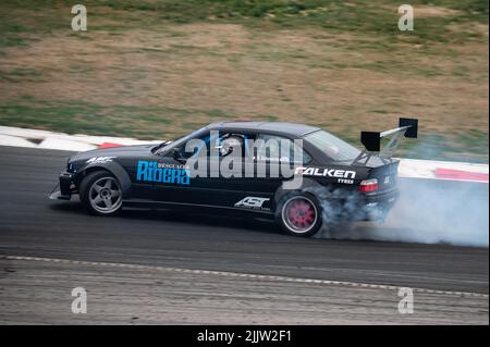 Black Bmw E36 drift at the Navarra circuit Stock Photo - Alamy