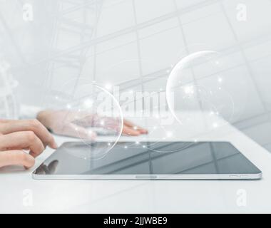 Engineer or businesswoman using tablet pc on the internet technology background. Stock Photo