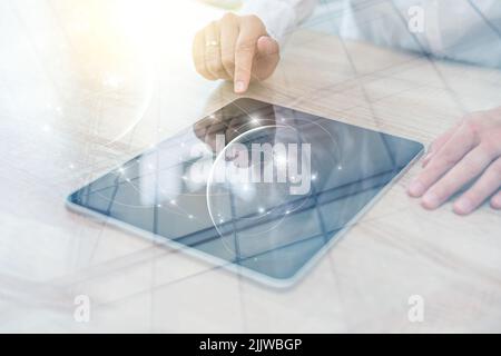 Engineer or businesswoman using tablet pc on the internet technology background. Stock Photo
