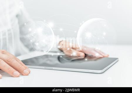 Engineer or businesswoman using tablet pc on the internet technology background. Stock Photo