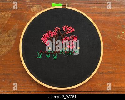 Homemade embroider pattern in hand embroidery textile Stock Photo