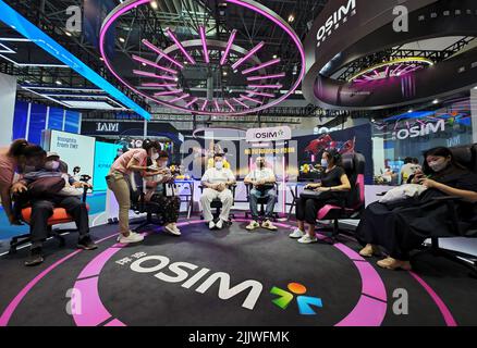 Haikou, China's Hainan Province. 28th July, 2022. Visitors experience massage chairs for esports at the second China International Consumer Products Expo (CICPE) in Haikou, south China's Hainan Province, July 28, 2022. Credit: Guo Cheng/Xinhua/Alamy Live News Stock Photo