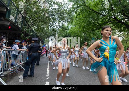 A large crowd of people coming out to celebrate the Puerto Rican Day Parade in New York City Stock Photo