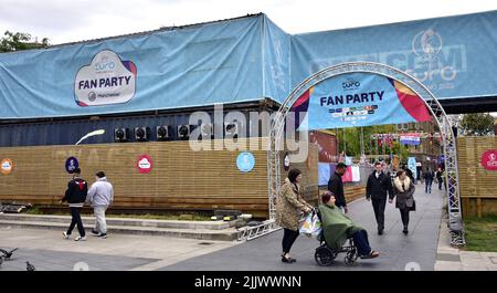 Fan Party site for UEFA Women’s EURO 2022, Piccadilly Gardens, Manchester, Greater Manchester, England, United Kingdom, British Isles. The site's final day will be 31st July, 2022, when the England women's football team, nicknamed the lionesses, play Germany at Wembley. Organisers said: 'Celebrate UEFA Women’s EURO 2022 with a Fan Party at Manchester's picturesque Piccadilly Gardens. The Fan Party will welcome fans and friends of all ages, from home and abroad, to be a part of the biggest ever European women’s sporting event.' Stock Photo